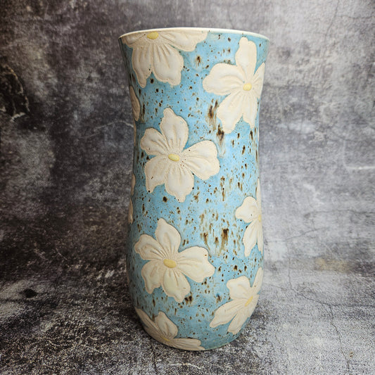 Lilies on baby blue vase