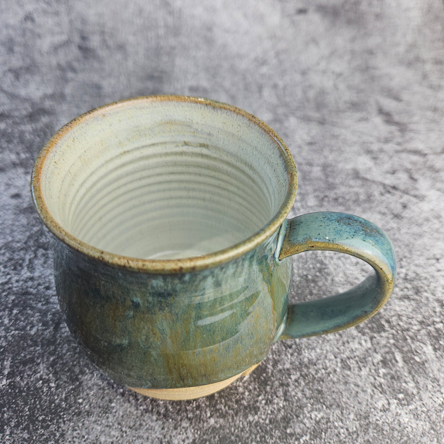 Deep greens on buff mug