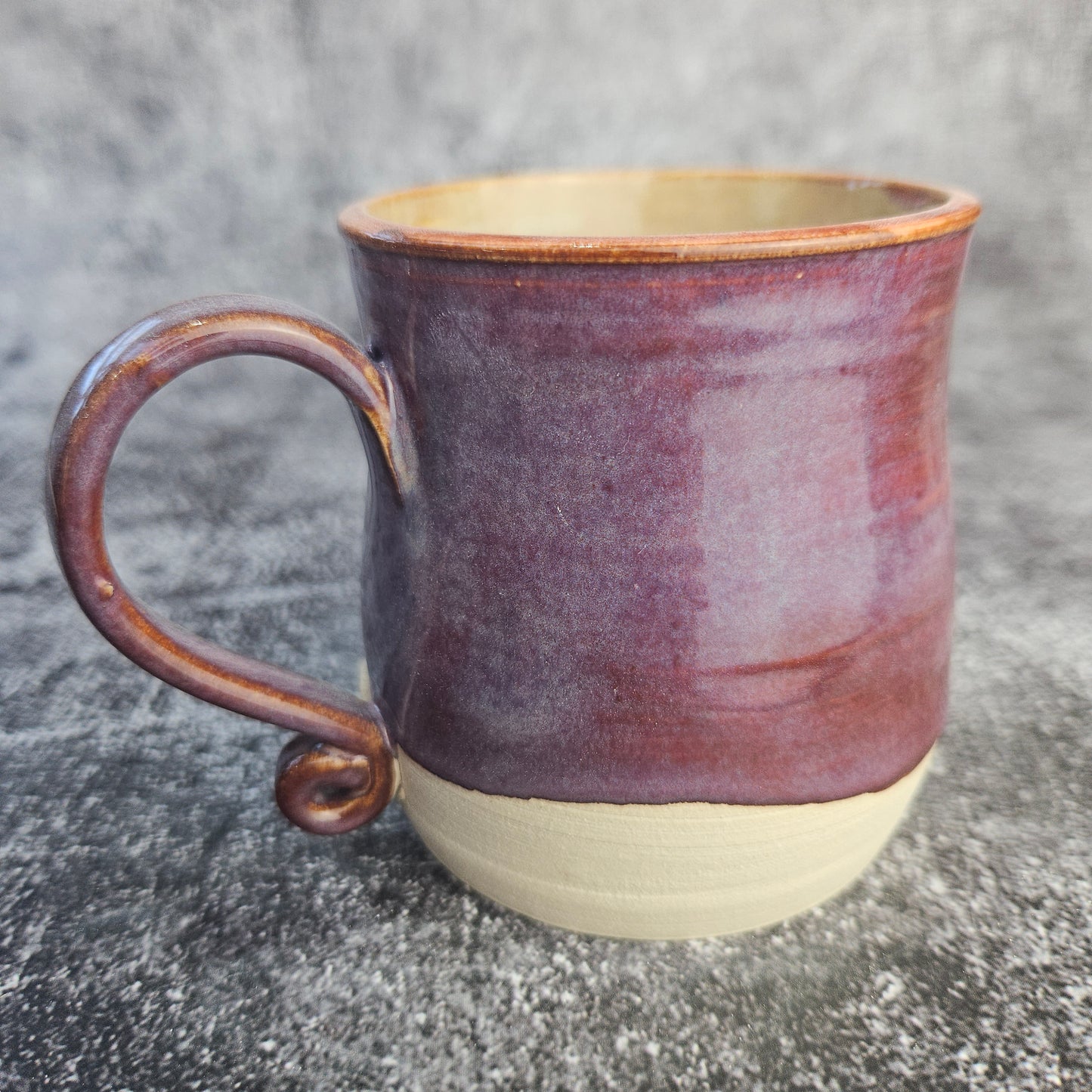 Burgundy mug with scroll handle