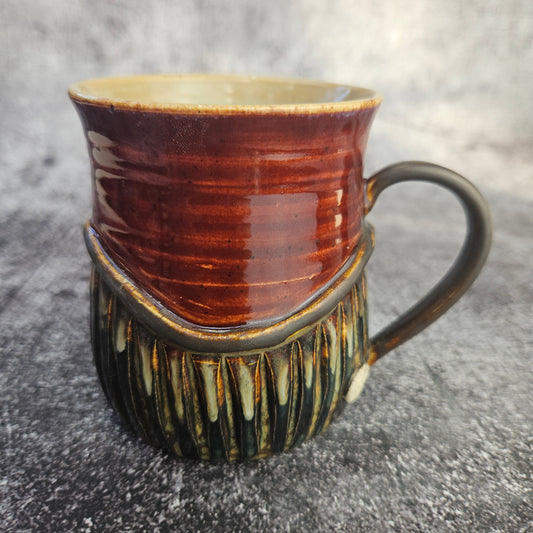 Deep red carved mug