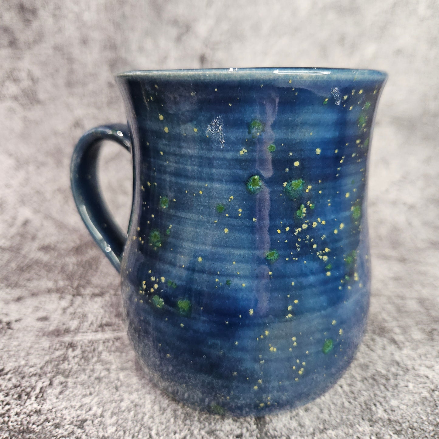 Mardi Gras Dragon Eye Mug. R/H Handle