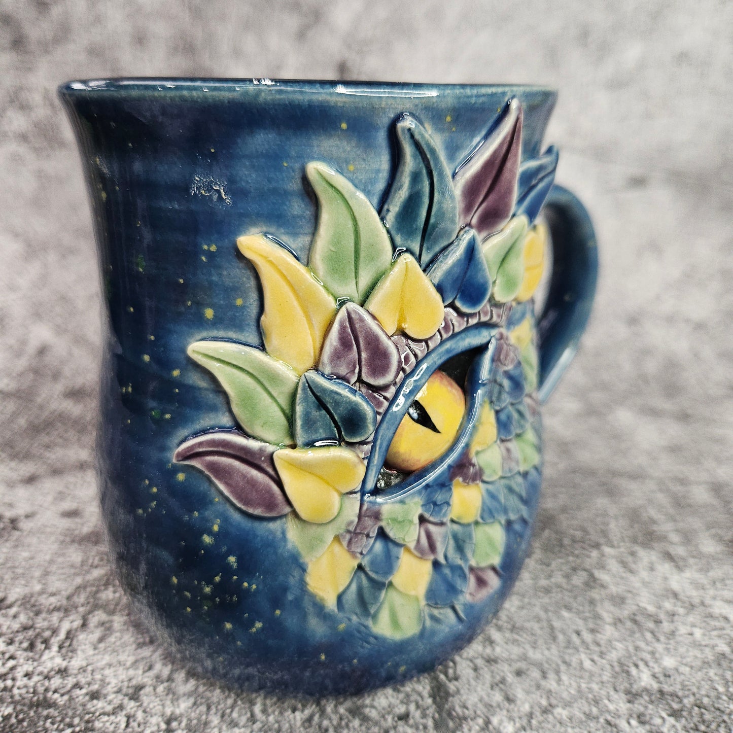 Mardi Gras Dragon Eye Mug. R/H Handle