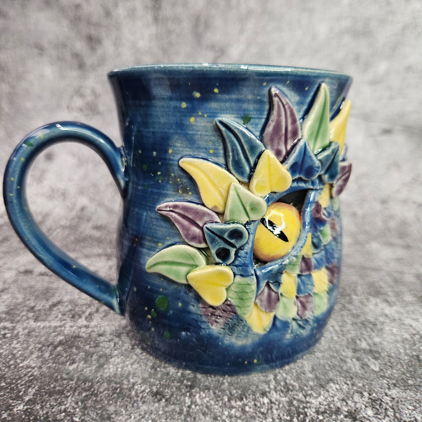 Mardi Gras Dragon Eye Mug. L/H Handle