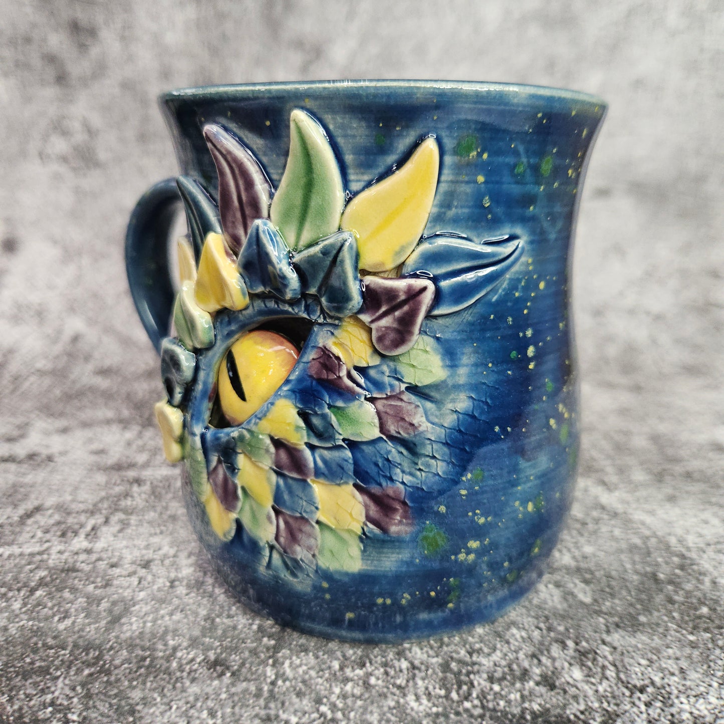 Mardi Gras Dragon Eye Mug. L/H Handle